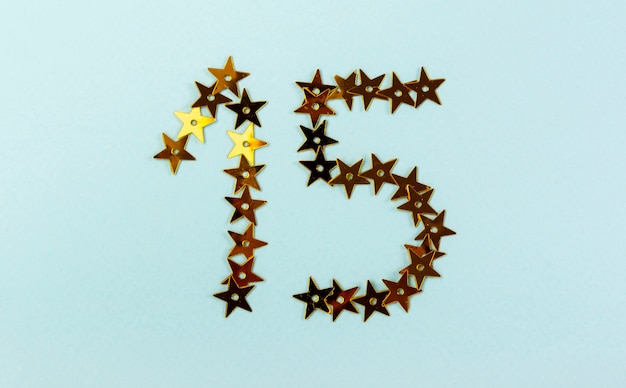 Free Photo creative arrangement for quinceañera party with golden stars