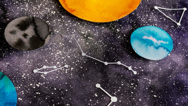 Free photo creative composition of paper planets