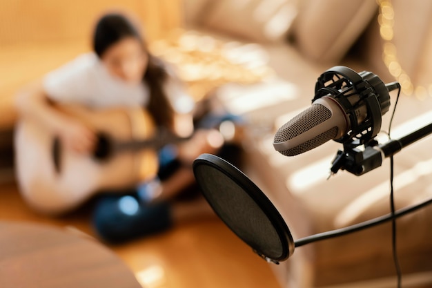 Creative woman practicing a song at home