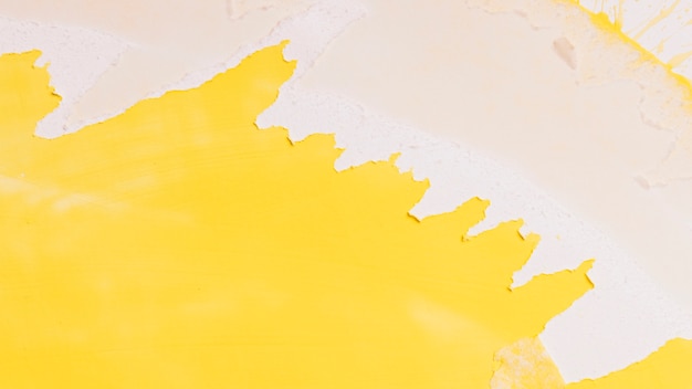 Free photo creative yellow paint splash background