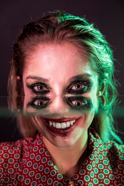 Free photo creepy halloween photography of a woman with four eyes