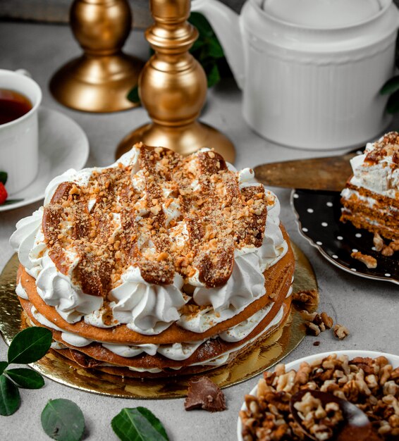 Crepe cake with cream on the table