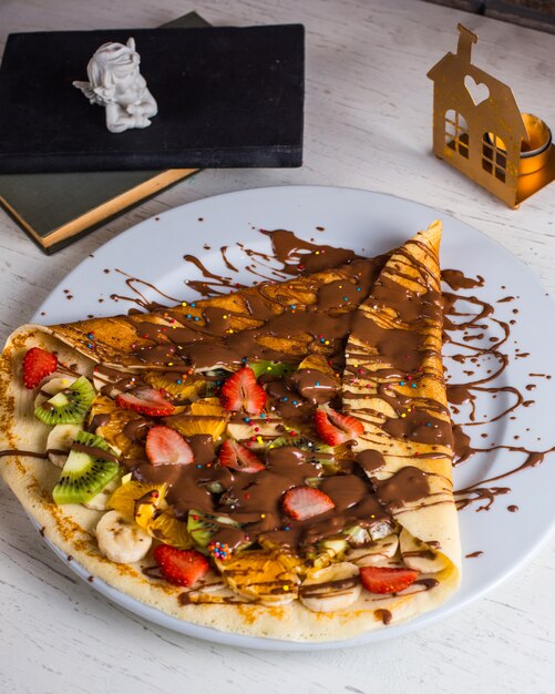 Crepe with fruits and chocolade