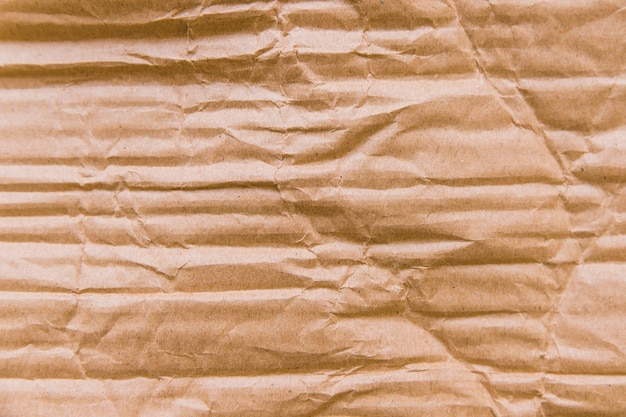 Free photo crinkled cardboard texture