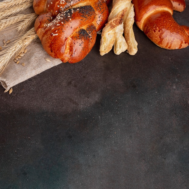 Croissant and pastry with wheat grass