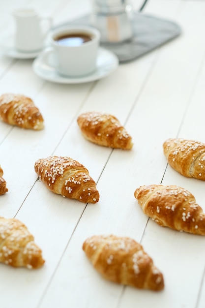 Free Photo croissants and a hot drink