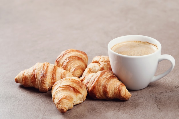 Free photo croissants with coffee cup