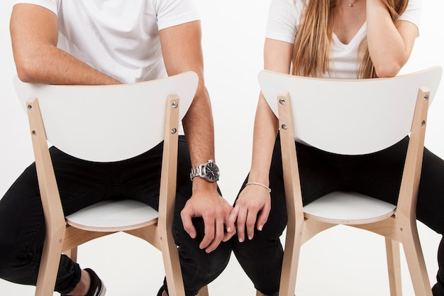 Crop couple on chairs