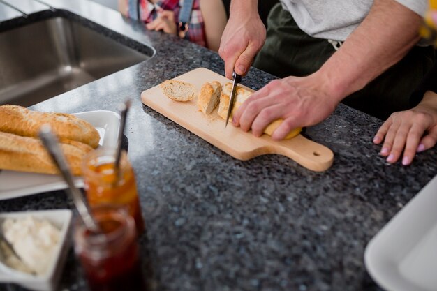 Crop family cutting bread