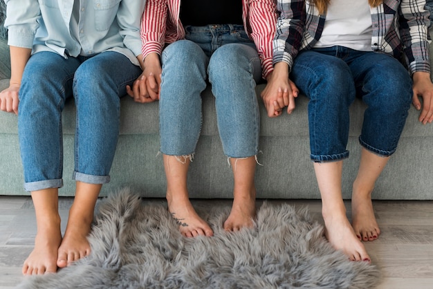 Free Photo crop females relaxing on sofa