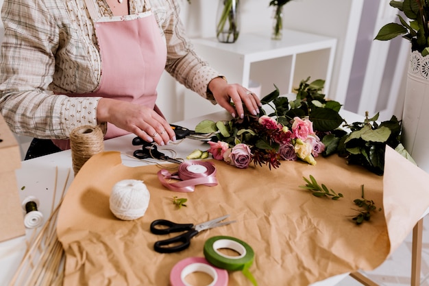 Free Photo crop florist preparing flowers