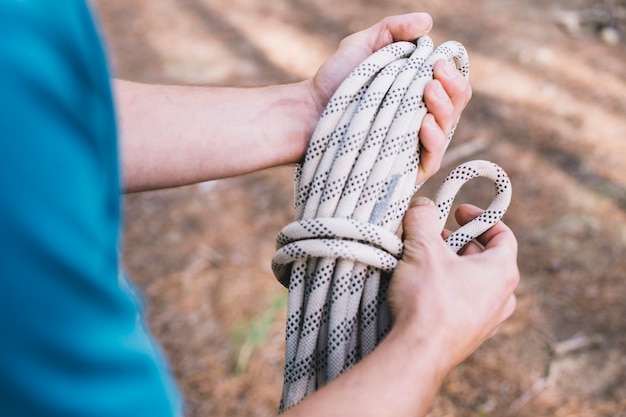 Free photo crop person with rope