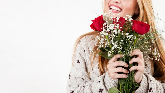 Crop woman with lovely bouquet