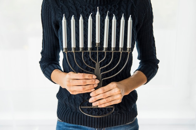 Free Photo crop woman with menorah