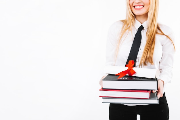 Free photo crop woman with textbooks and diploma