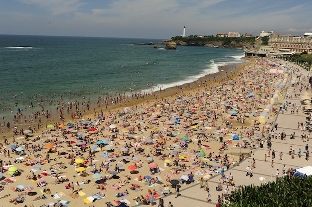 Crowded beach in summer season, aerial view