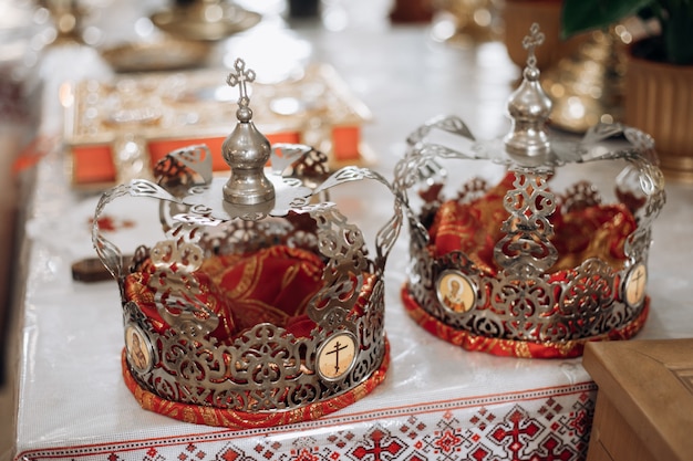 Free photo crowns are lying on the table in church