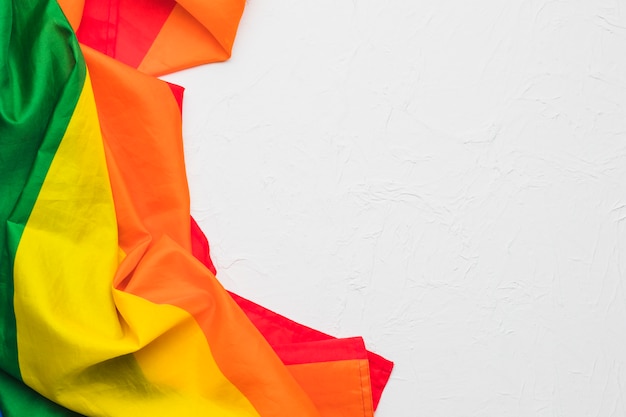 Free photo crumpled multicolored cloth on white background