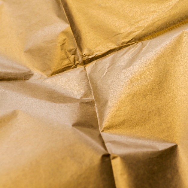 Free Photo crumpled squared of gold foil