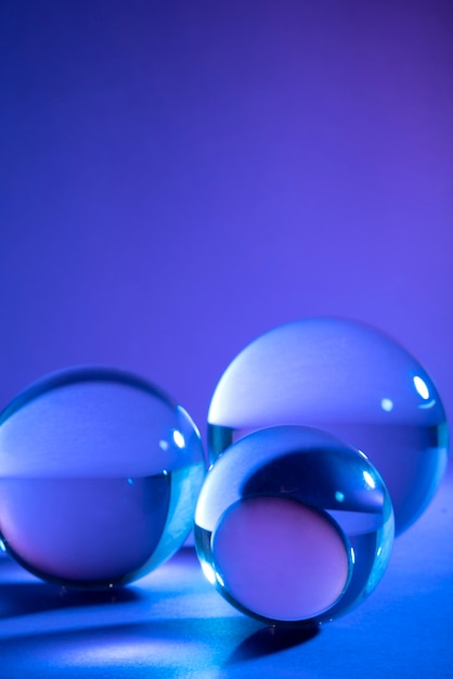 Free Photo crystal balls with blue background