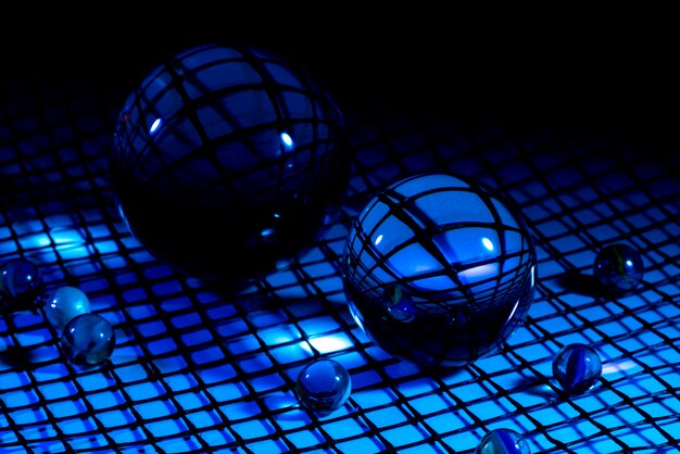 Free Photo crystal balls with blue background