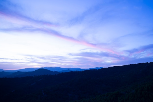 Crystal blue sky with mountains