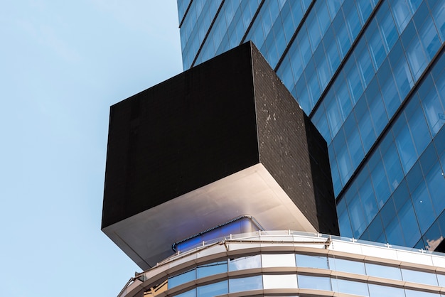 Free Photo cubic mock-up billboard in city scape