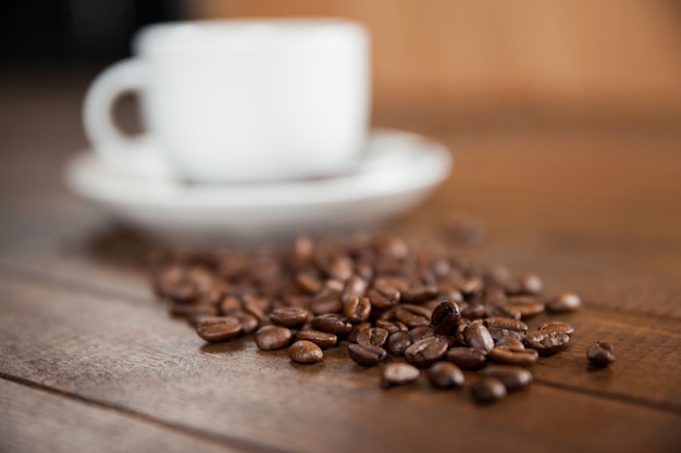 Cup of coffee and coffee beans