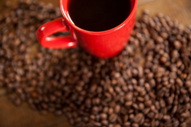 Cup of coffee and coffee beans