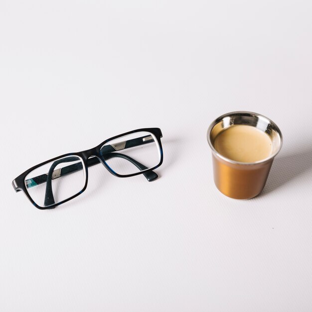 Cup of coffee and glasses