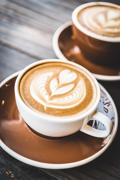 Cup of coffee with a foam flower