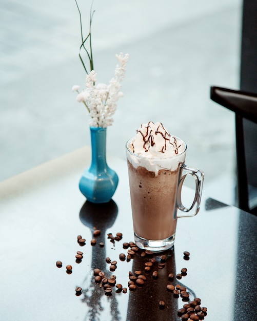 Cup of hot chocolate with cream