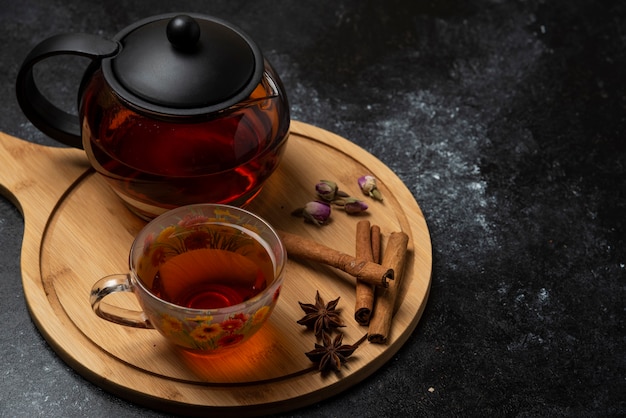 A cup of tea with flavour spices and herbs.