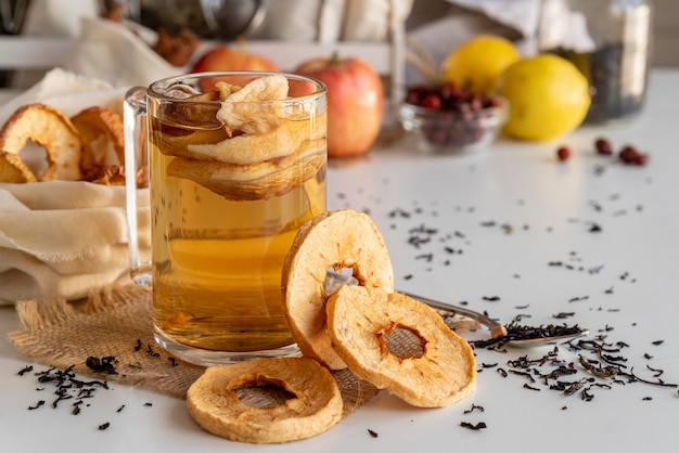 Cup with peach tea on dek