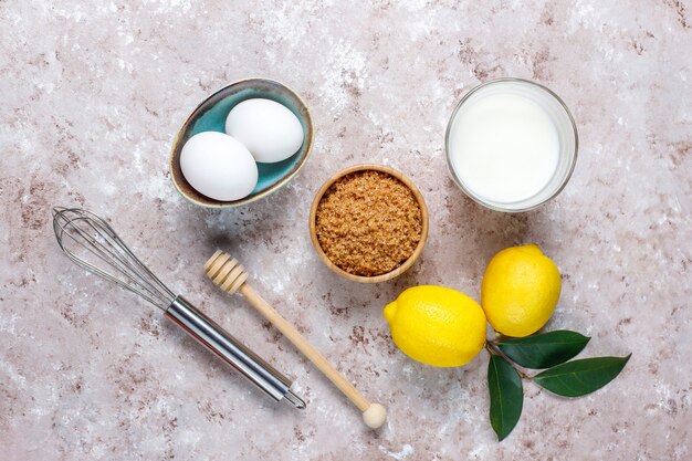 Cupcake baking background with kitchen utensils.