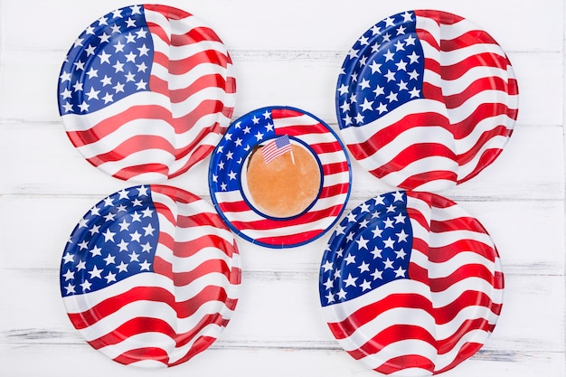 Cupcake with American flag and plates in image of American flag