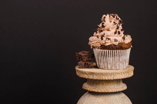 Cupcake on wooden stand