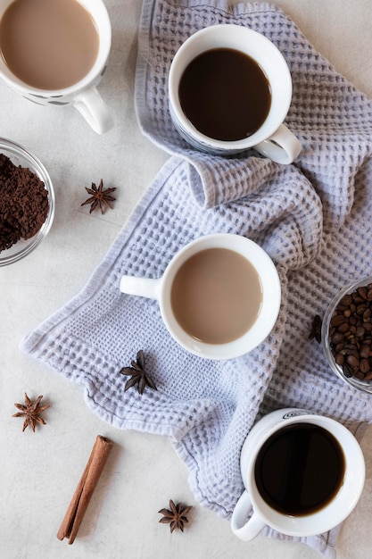 Cups of coffee on table