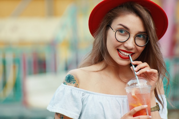 Free photo curious girl  waiting for party news on colorful background