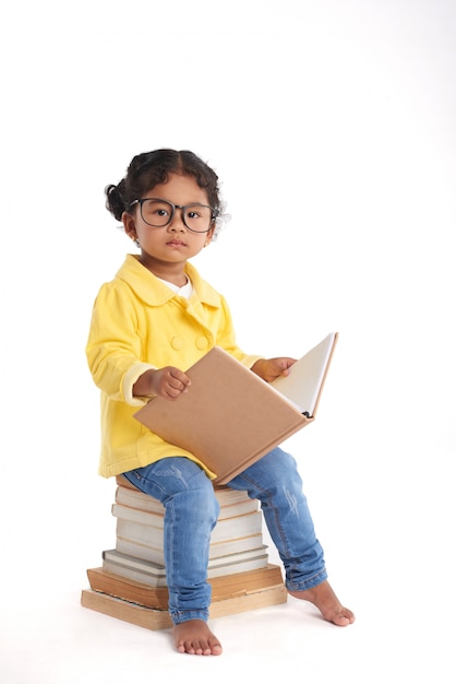 Curious Little Girl with Book