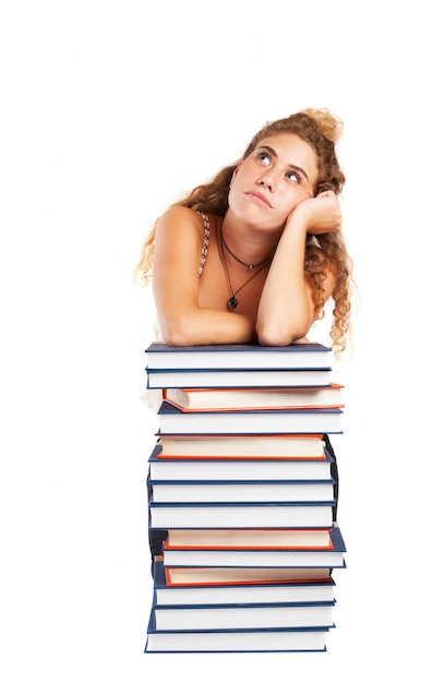 Free photo curly-haired young woman thinking