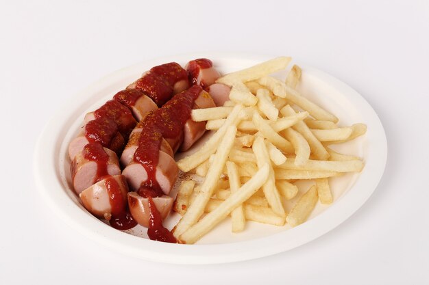 Curry wurst with sauce and french fries