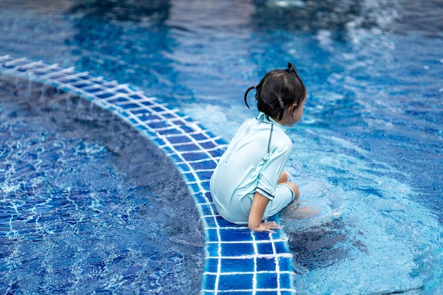 Free photo cute asian small girl in a pool