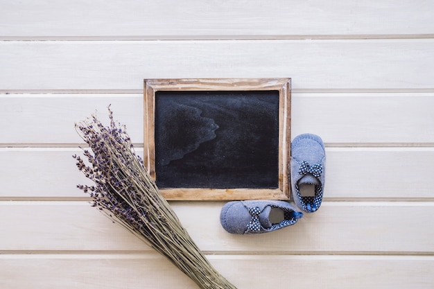 Free Photo cute baby concept on wooden surface