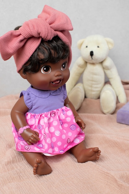 Free photo cute  baby doll for children still life