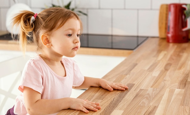 Cute baby girl at home