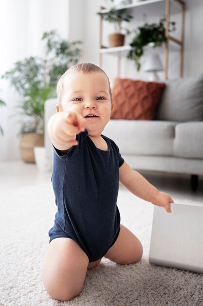 Cute baby going for their first steps