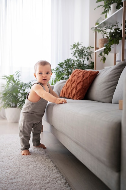 Cute baby going for their first steps