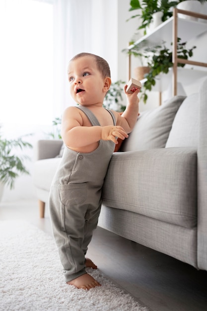 Cute baby going for their first steps