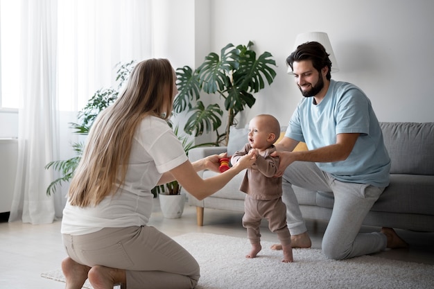 Free photo cute baby going for their first steps